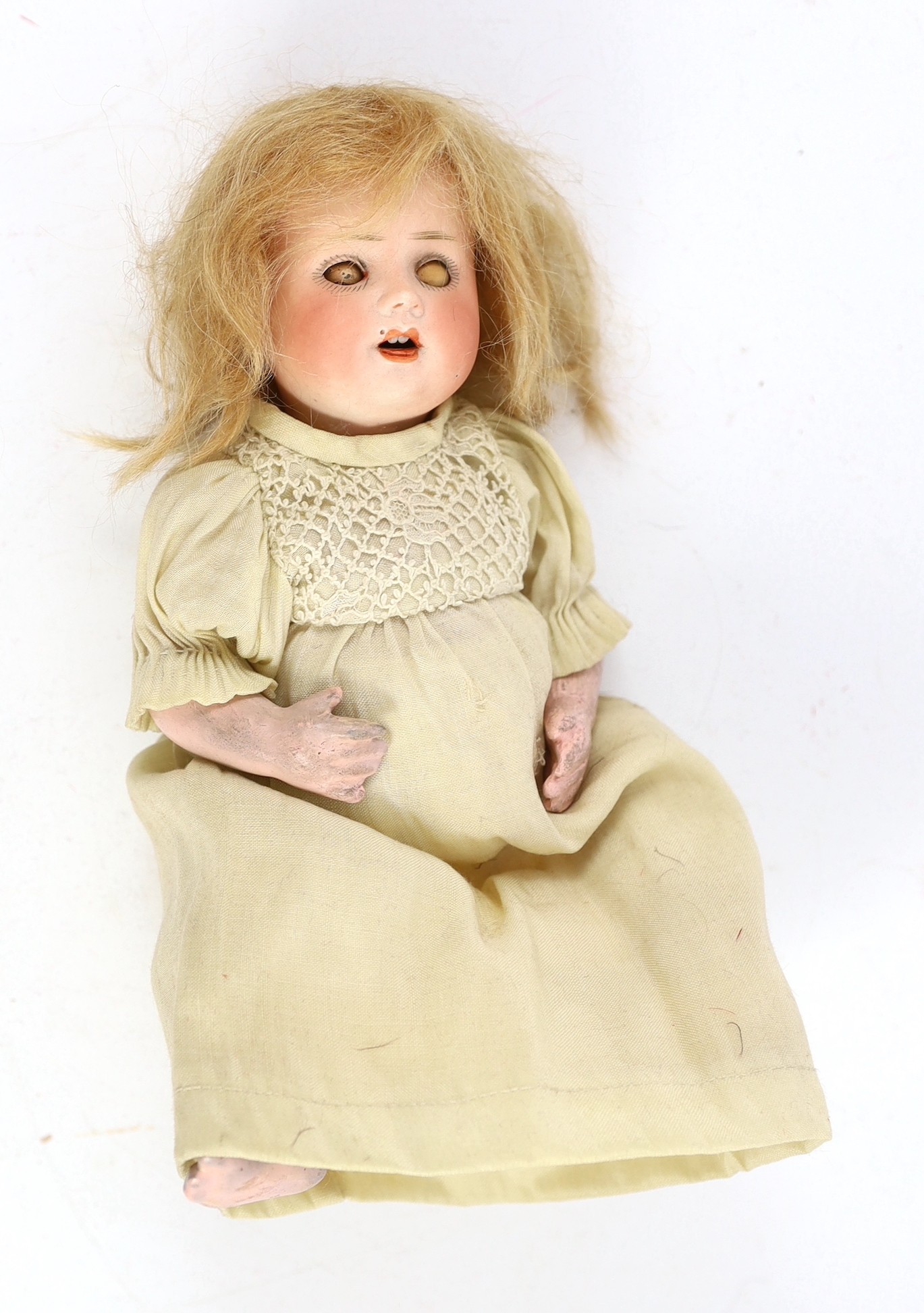 A pair of Recknagel bisque headed dolls, German, circa 1900, 8in. (4)